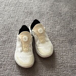 Under Armour White Cream Athletic Shoes with Black Collar